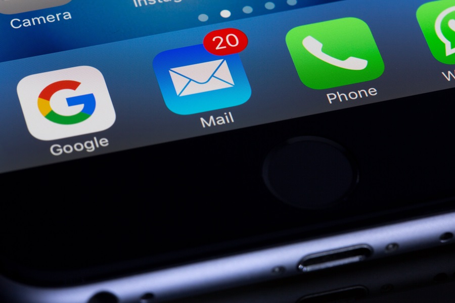 Protect Your Email from spam and potential threats - Image of Iphone with email button on bottom